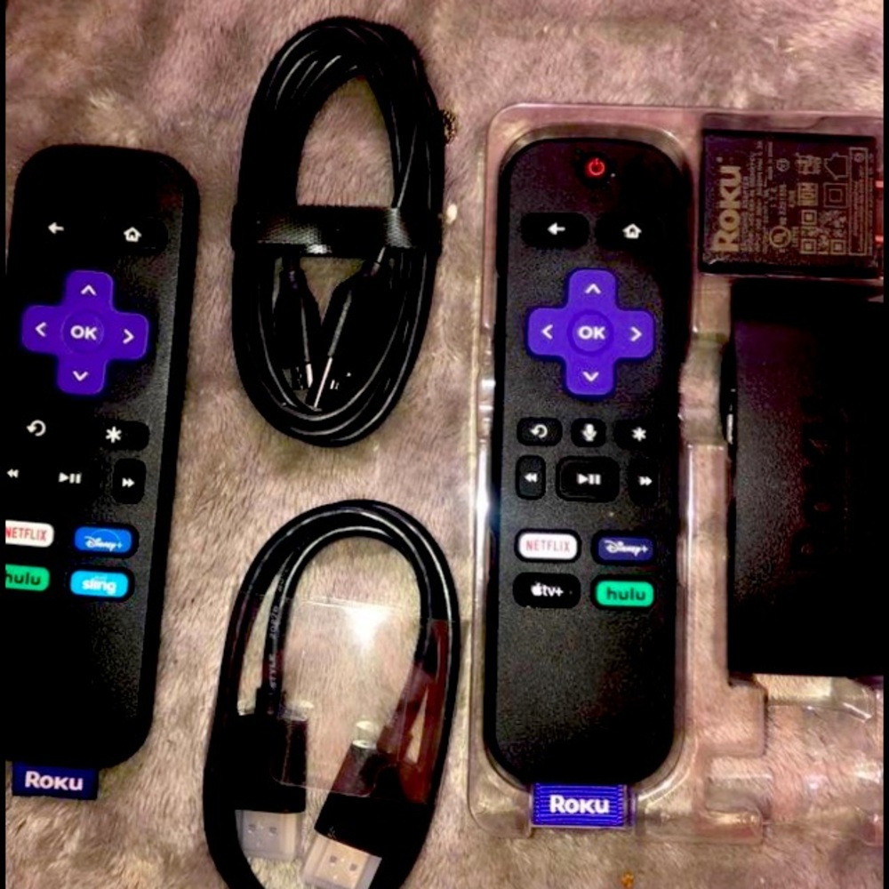 BRAND NEW 4K STREAMING DEVICE WITH EXTRA REMOTE.
